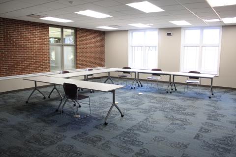 Picture of Meeting Room F with tables and chairs